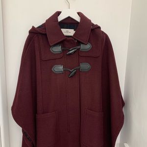 Brand new never worn Coach cape
